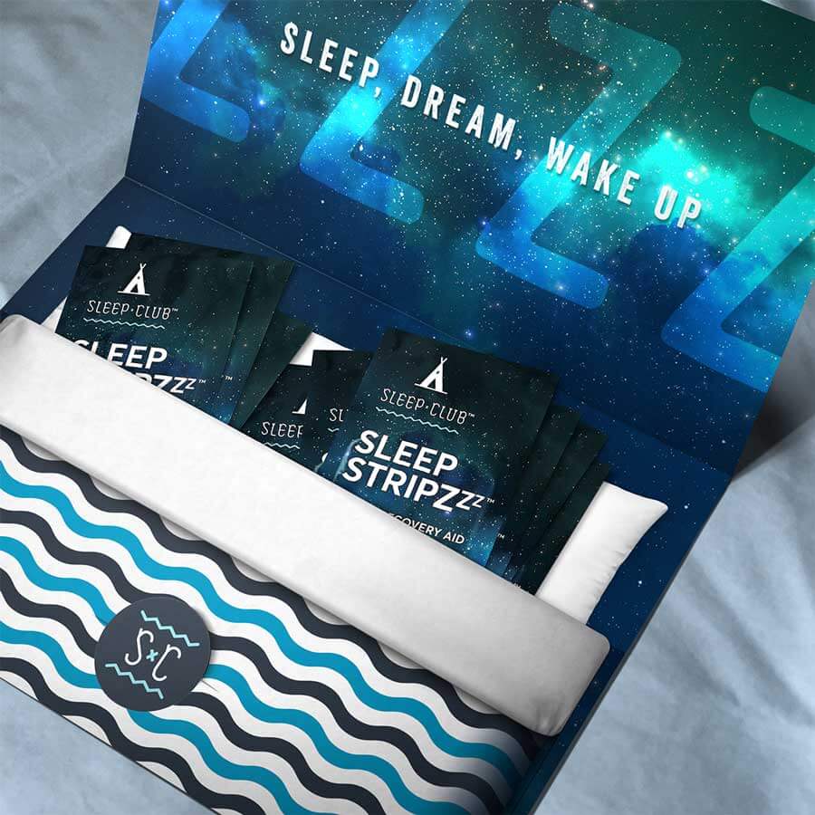 An open Sleep Stripzzz package showing 9 sleep aid packets. SLEEP, DREAM, WAKE UP displayed on inside cover.